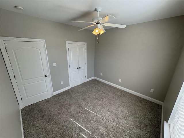 unfurnished bedroom with carpet flooring and ceiling fan