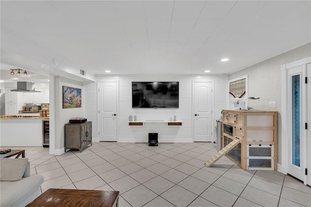 tiled living room with wine cooler