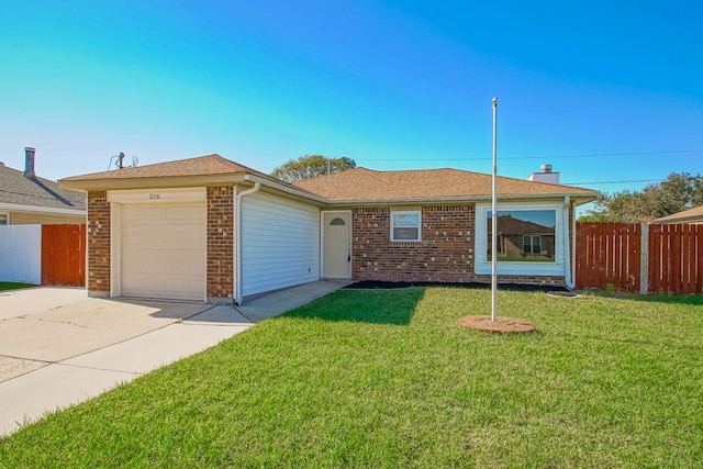 ranch-style home with a front yard and a garage