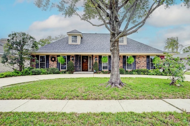 view of front of home with a front yard