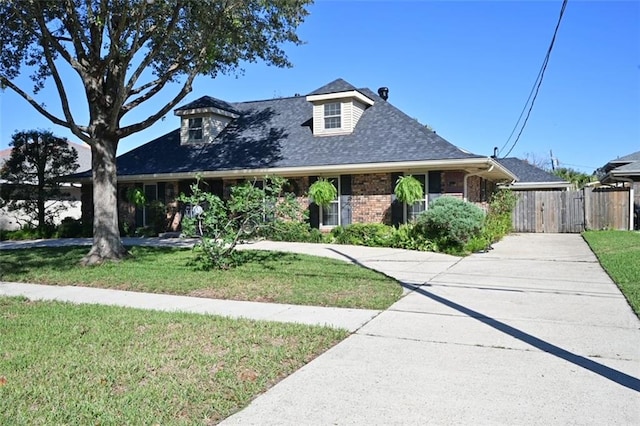 view of front of home with a front lawn