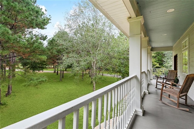 balcony featuring a porch