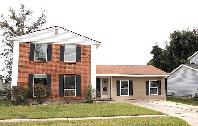 view of front of house with a front lawn