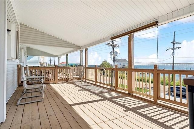 180 Lakeview Dr Unit A, Slidell, LA 70458 - wooden deck featuring a water view