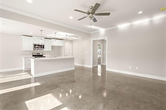 unfurnished living room with ceiling fan, crown molding, and sink