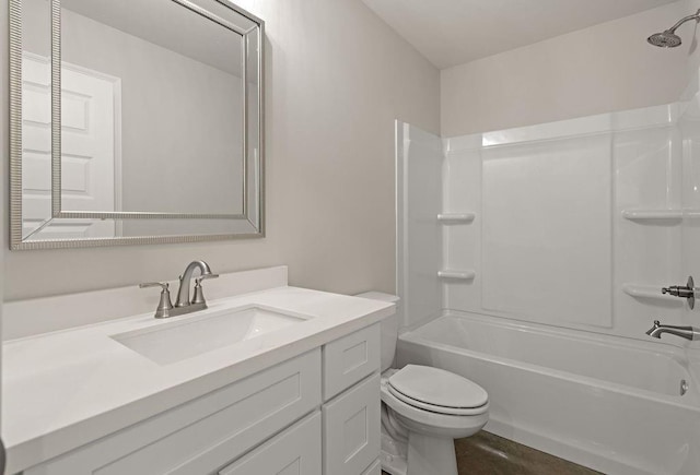 full bathroom featuring washtub / shower combination, vanity, and toilet