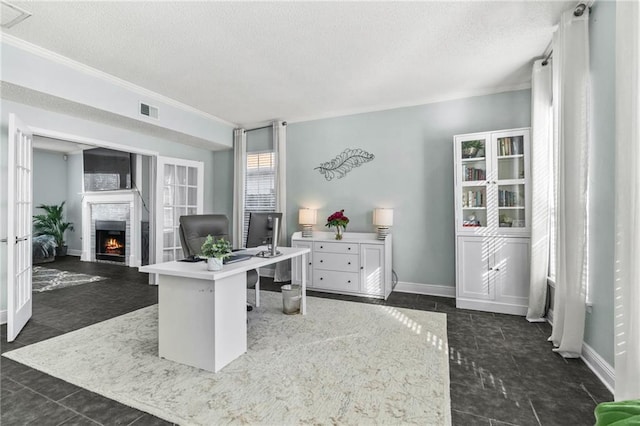 tiled office space featuring a textured ceiling and ornamental molding