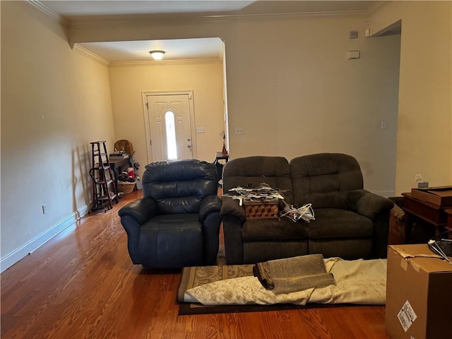 living room featuring wood-type flooring and crown molding