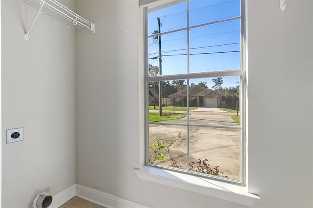 clothes washing area with hookup for an electric dryer