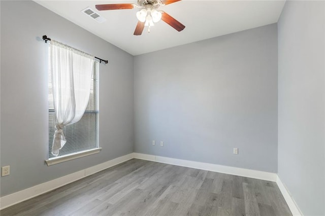 unfurnished room featuring ceiling fan and light hardwood / wood-style floors