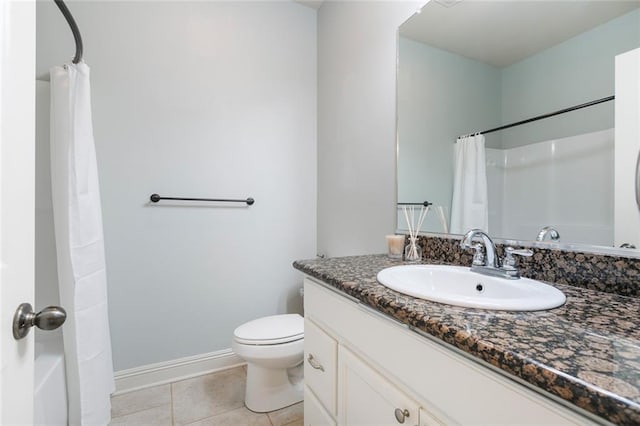 bathroom featuring tile patterned floors, vanity, a shower with shower curtain, and toilet