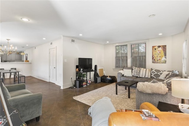 living room featuring an inviting chandelier