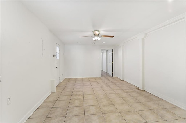 tiled empty room with ceiling fan