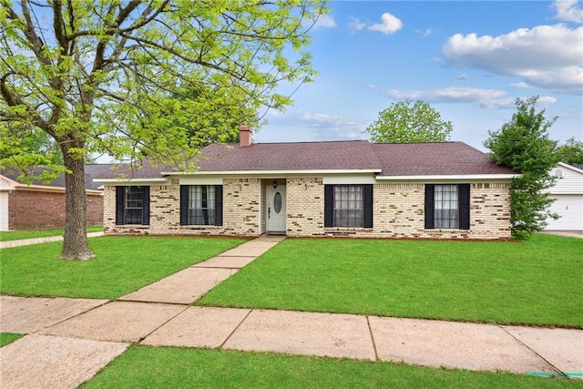 single story home with a front yard