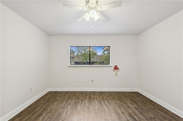 unfurnished room featuring ceiling fan and dark hardwood / wood-style floors