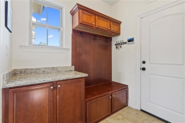 mudroom featuring light tile patterned flooring