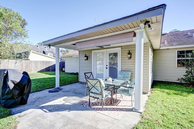 view of patio / terrace featuring a grill and french doors