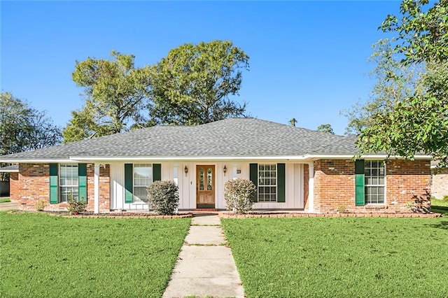 single story home with a front yard