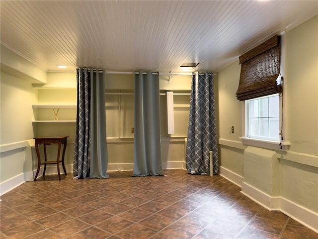 interior space featuring wood ceiling