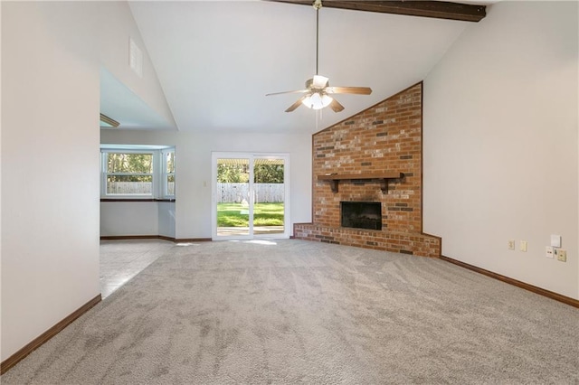 unfurnished living room featuring light carpet, a fireplace, ceiling fan, and high vaulted ceiling