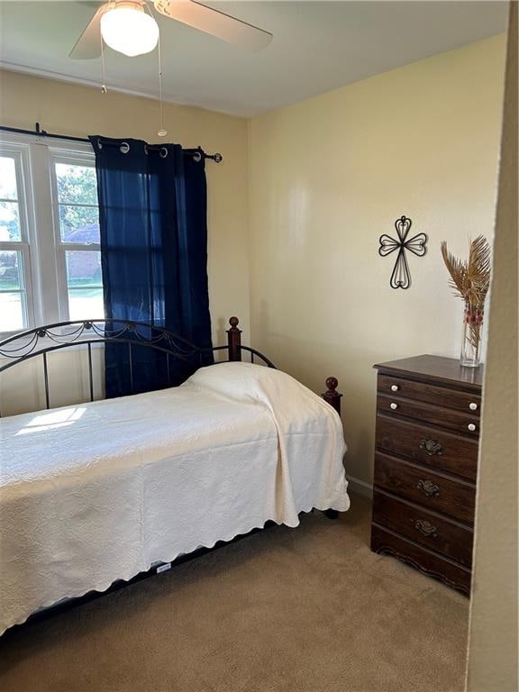 bedroom with carpet floors and ceiling fan