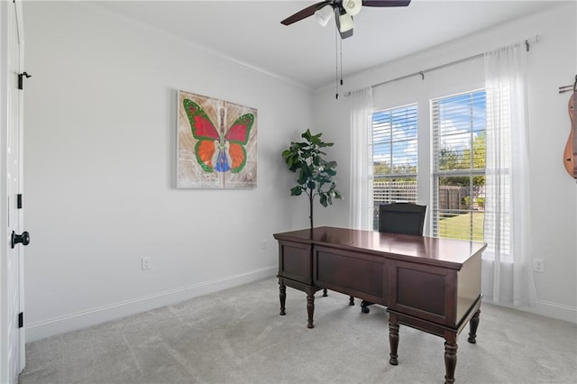 home office with ceiling fan and light colored carpet