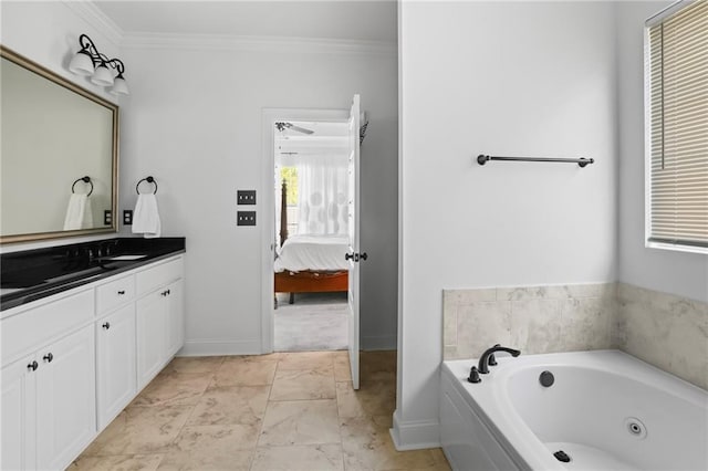 bathroom featuring a bath, vanity, and ornamental molding