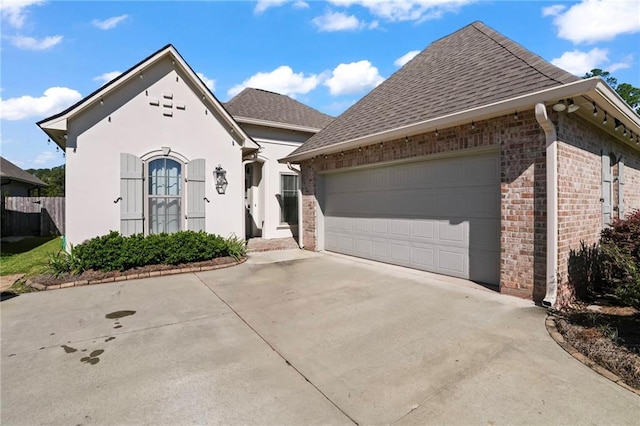 view of front of home featuring a garage