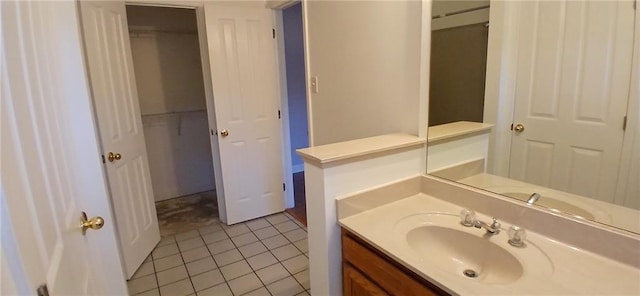 bathroom featuring tile patterned floors and vanity