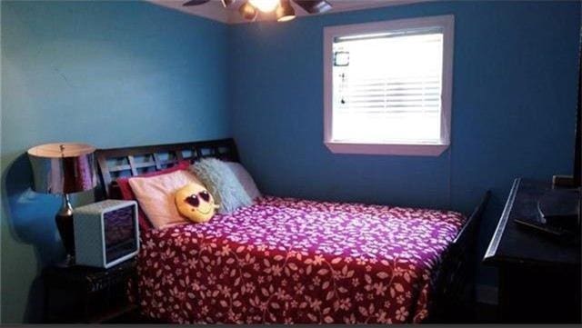 bedroom featuring ceiling fan