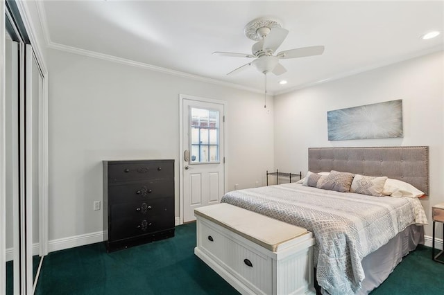 carpeted bedroom featuring ceiling fan and ornamental molding