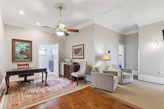 office area featuring hardwood / wood-style floors, ceiling fan, and crown molding