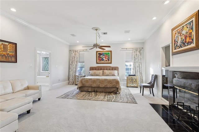 carpeted bedroom featuring ceiling fan, ornamental molding, and multiple windows