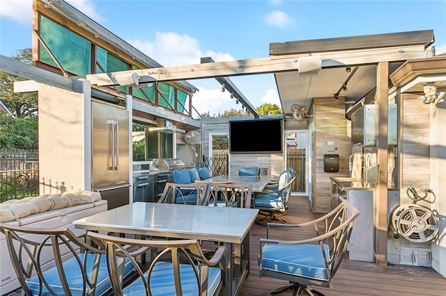 view of patio / terrace featuring a deck and grilling area