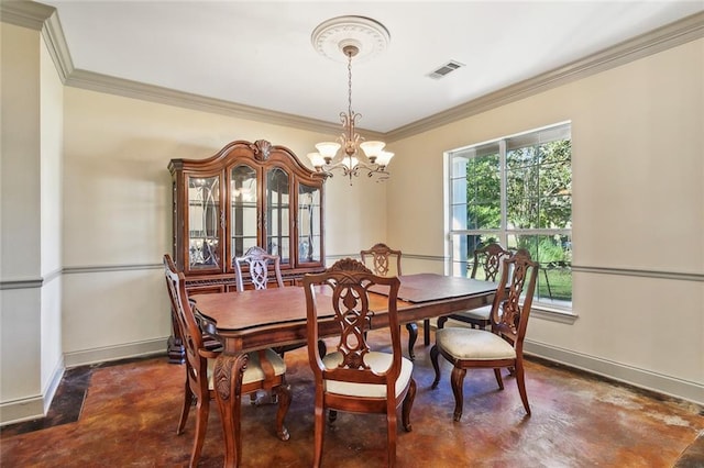 dining room with ornamental molding and an inviting chandelier