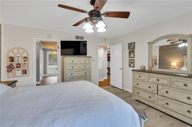 bedroom featuring ceiling fan and light wood-type flooring