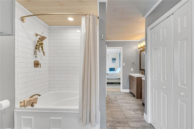 bathroom featuring vanity, shower / bathtub combination with curtain, ornamental molding, and wood ceiling