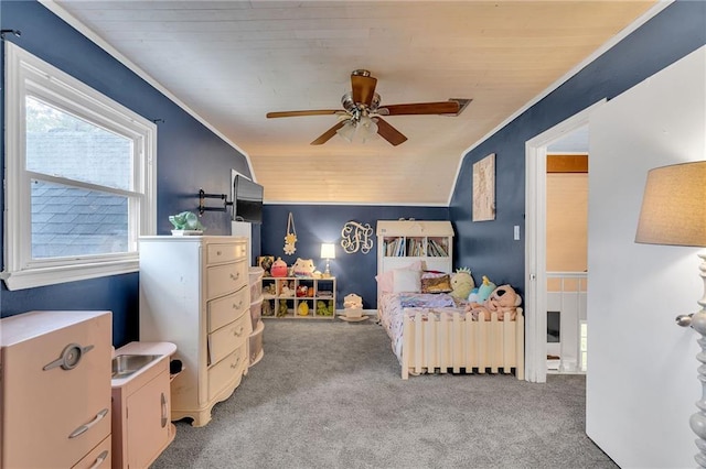 bedroom with ceiling fan, light colored carpet, wood ceiling, and ornamental molding