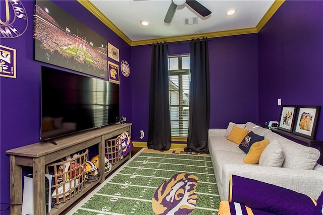 interior space featuring crown molding, ceiling fan, and hardwood / wood-style flooring