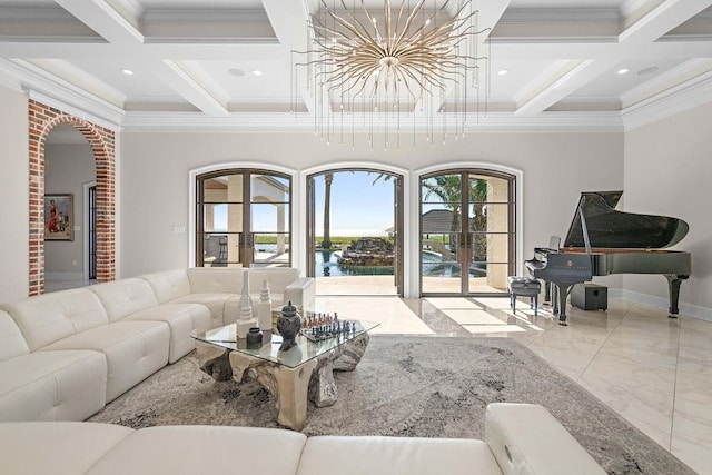 living room with ornamental molding, a water view, and coffered ceiling