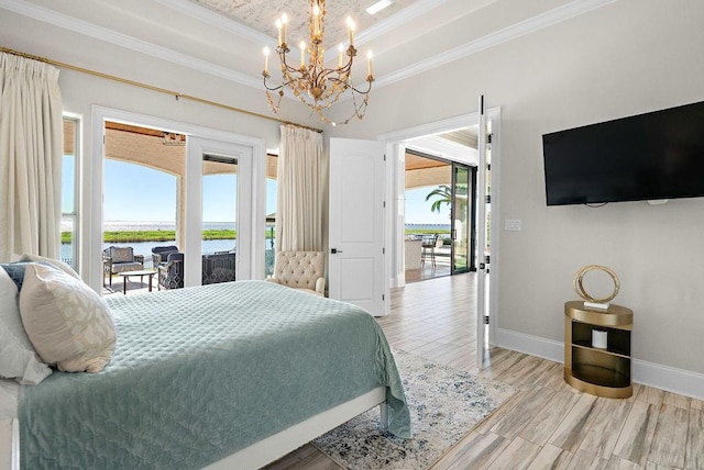 bedroom with light wood-type flooring, access to outside, multiple windows, and ornamental molding