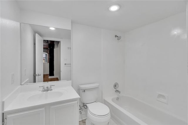 full bathroom featuring tile patterned floors, vanity, shower / bath combination, and toilet