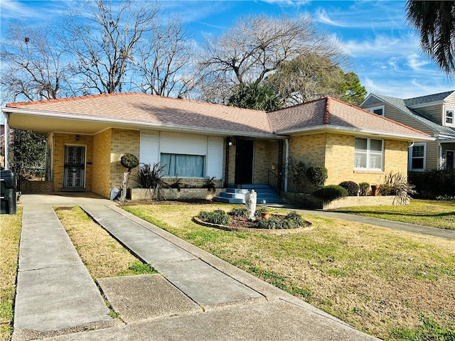 single story home with a front yard