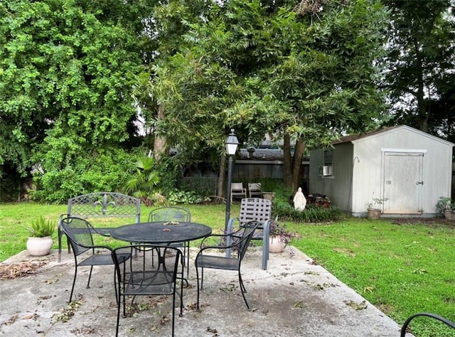 view of patio with a storage shed