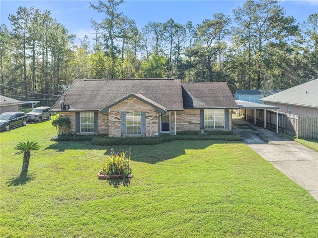 ranch-style house featuring a front lawn and a carport