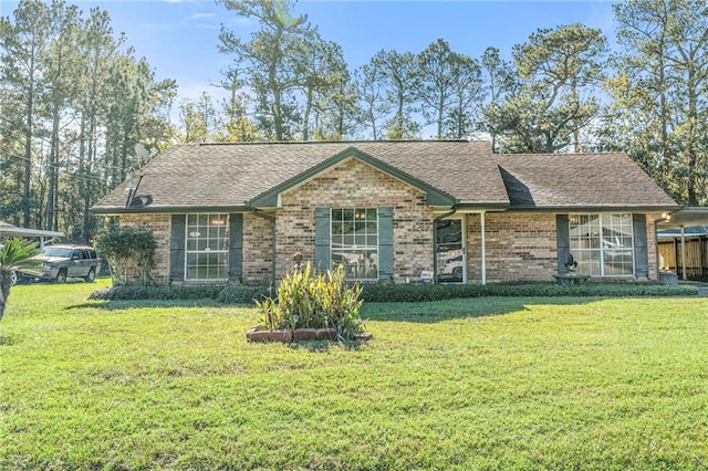 single story home with a front yard