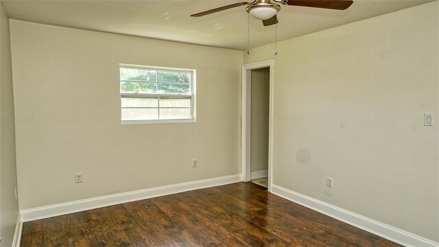 361 Helis Dr, Westwego, LA 70094 - empty room featuring ceiling fan, baseboards, and dark wood finished floors