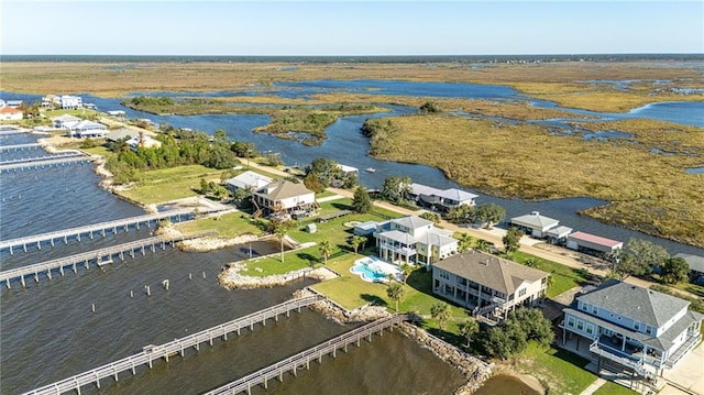 aerial view of residential area with a nearby body of water