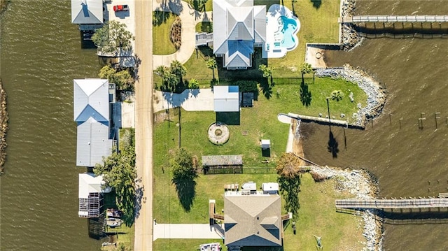 bird's eye view with a water view