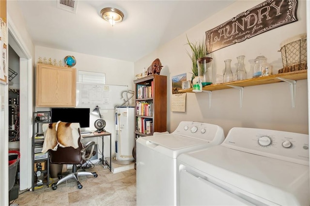 laundry area with separate washer and dryer and water heater